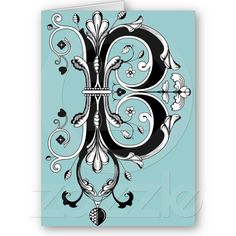 the letter e is decorated with flowers and swirls on a light blue paper background