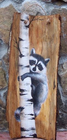 a painting of a raccoon peeking out from the bark of a birch tree