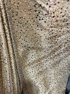 this is the most luxuries designer heavy beaded sequins stone lace designer fabrics great for wedding dress prom table cover and much more  color: old gold     weight: 58" inches  made: in Italy length: sold every yard multiple and continuous cut however we can help u to cut the way you ask us to thank you  care: mashie washable  DISCAIMER: WE HAVE MADE AN AFFORT TO PROVIDE FABRICS IMAGES THAT COLOSELY REPRESENT THAT FABRICS SHOW THE COLOR ANS TAXTURE HOWEVER DUE TO ALL THE POSSIBLE VARANTS { LI Dress Table, Sewing Machine Needle, Sequin Beading, Dress Prom, Red Silk, Table Cover, Table Covers, Light Source, Black Fabric