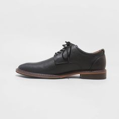 From formal meetings and events to family functions, these Leo Oxford Dress Shoes from Goodfellow & Co™ are a great pick to complete your ensemble. These medium-width shoes feature a cushioned footbed for comfy wear, making them great for both special occasion and everyday wear. With a sleek upper with stitched detailing and a lace-up front, they're perfect for creating a sharp, stylish look. Goodfellow & Co™: Where style & fit are always in good company. Black Lace Up Dress, Dress Up Shoes, Comfortable Dress Shoes, In Good Company, Comfy Wear, Black Dress Shoes, Oxford Dress Shoes, Black 13, Oxford Dress