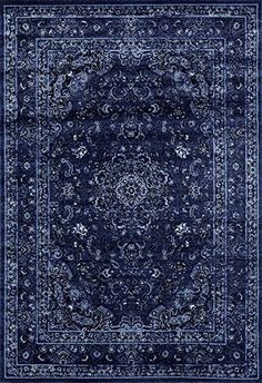 a blue rug with an ornate design on it