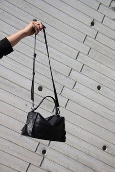 Mini Valley Cube Shoulder Bag-Black is simple and elegant, its spacious interior provides room for all the daily essentials and more, it is perfect for everyday use.This bag is made with premium full-grain Italian leather and lined with Micro Fiber, It has a full zipper closure, with an additional inner zipper pocket, it featuring an adjustable leather shoulder strap. This bag can be carried crossbody or on the shoulder.-Genuine Italian natural nappa leather-Lightweight-Long adjustable shoulder Sleek Bags With Detachable Strap For Everyday Use, Sleek Bag With Detachable Strap For Everyday Use, Sleek Crossbody Bag For Everyday Use, Sleek Satchel Bag For Everyday Use, Sleek Shoulder Bag With Detachable Strap For Everyday, Sleek Satchel With Removable Pouch For Everyday Use, Sleek Everyday Satchel With Detachable Strap, Sleek Satchel For Everyday Use, Sleek Black Shoulder Bag For Everyday Use