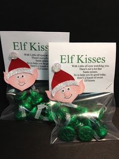 two bags filled with green candies sitting on top of a table next to each other