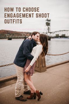 a man and woman kissing in front of water with the words how to choose engagement shoot outfits