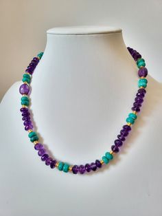 *This necklace is made entirely of natural faceted amethyst stones of approximately 5mm. * Turquoise stones are magnesites in turquoise blue. *It measures 47cm. *Its clasp is vintage style filigree. *The necklace is mounted in 14k gold plated *Handmade item *Free delivery by post by registered letter * Necklace for women * Delivered in its reusable cotton protective pouch * Instagram _atelier768_ * Semi-precious stone necklace * Unique piece Turquoise Amethyst Necklace With Natural Stones, Amethyst Stones, Necklace Unique, Bleu Turquoise, Turquoise Stones, Letter Necklace, Amethyst Stone, Jewellery Making, Unique Necklaces