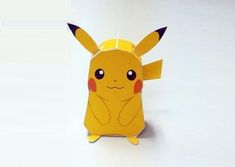 an origami pokemon pikachu with big eyes