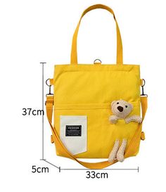 Cute Bear Shoulder Bag PN4891 ●Size:37*33*5 cm.●Material :canvas (Please allow 1-3cm differs due to manual measurement.As different computers display colors differently,the color of the actual may vary slightly from the above images.Thanks for your understanding.) ●About Shipping: We attach great importance to the orders of each customer and parcel delivery. 1.Processing time: 2-3 business days. 2.Shipping time: 10-15 business days to US, please allow 3-4 weeks shipping to other country.(Shipping times can be affected by variable customs clearance times or public holidays.) Cotton Shoulder Bag Backpack For Daily Use, Large Capacity Square Canvas Bag For School, Daily Use Cotton Shoulder Backpack, Square Canvas Bag With Removable Pouch For School, Fabric Backpack For Daily Use, Large Capacity Canvas Bags For Students, Canvas Satchel Shoulder Bag For Students, Large Capacity Canvas Student Bags, Double Handle Canvas Bag For School