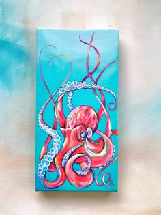 an octopus painting on a blue background