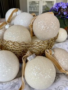 some white balls in a basket on a table