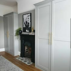 a living room filled with furniture and a fire place