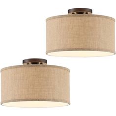 two lamps that are on top of each other, one is brown and the other is beige