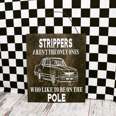 a wooden sign that says stripes aren't the only ones who like to be on the pole