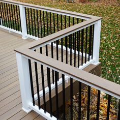 the railings on this deck are made of wood and metal