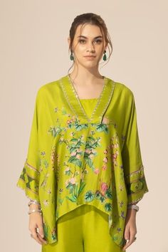 Olive green botanical printed short kaftan with sequins, stones and beaded hand embroidered neckline and sleeves. Comes with ankle-length pant and a slip. - Aza Fashions Green V-neck Sets With Printed Motifs, Green Silk Sets With Digital Print, Traditional Silk Top With Floral Print, Festive Green Floral Print Tops, Traditional Green Floral Print Top, V Neck Kaftan, Short Kaftan, Silk Kaftan, Dupion Silk