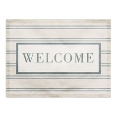 a welcome mat with blue and white stripes on the bottom that says,'welcome '