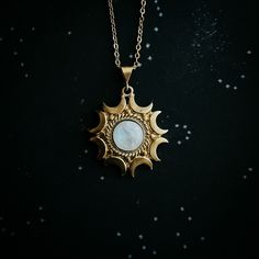 "Bring out your inner Moon witch and lunar Goddess and celebrate the feminine connection between us and our Moon. A beautiful brass pendant with a halo of crescent moons, set with a flashy piece of rainbow Moonstone. This necklace celebrates the mystery and majesty of our closest cosmic dance partner. A wonderful new age gift for the astrology lover or modern witch. Pendant Size: 1 1/2\" x 1\" (4.7cm x 3.2cm) Chain Length: 18\" (46cm) Materials: brass, rainbow moonstone Please remember - this pi Bohemian Crescent Moon Phase Jewelry, Mystical Adjustable Moon Phase Jewelry, Celestial Moon Shaped Necklace With Moon Print, Adjustable Mystical Moon Phase Jewelry, Spiritual Moonstone Nickel-free Necklace, Spiritual Nickel-free Moonstone Necklaces, Celestial Crescent Moon Phase Necklace, Handmade Celestial Half Moon Necklaces, Nickel-free Moonstone Spiritual Necklace