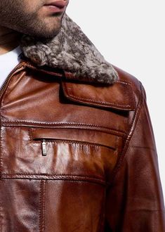 Reminiscent of old-world style mixed with contemporary feels, this Evan Hart Fur Brown Leather Jacket is one wardrobe essential you can't live without. Made in a luxuriously soft sheepskin leather, that's been given a burnished finish, a quilted viscose lining, detachable lamb wool collar, two pockets inside and four on the outside. Fox Collar, Leather Jacket For Men, Distressed Leather Jacket, Shirt Collar Styles, Best Leather Jackets, Collar Leather Jacket, Real Leather Jacket, Movie Fashion, Fashion Tv