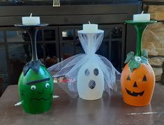 These wine glass candle holders are great for your Halloween party, or decorate any room.  Frankenstein,  Ghost, and pumpkin face. comes with candles. Wine Bottle Mummy, Pumpkin Wine Glass Candle Holder, Halloween Wine Bottle Crafts, Wine Glass Decorations, Wine Glass Candle Holders, Halloween Wine Bottles, Pumpkin Wine, Wine Glass Candle Holder, Halloween Arts