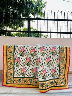 Add a touch of traditional Indian craftsmanship to your home with this beautiful handmade quilt made from 100% organic cotton. 🌸 Soft, sustainable, and vibrant, this quilt is perfect for cozy nights or as a stylish throw. The intricate patterns and rich colors showcase the art of skilled artisans, bringing both warmth and cultural heritage into your living space. 🌺🧵