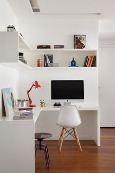 an instagram page with a white desk and chair in the corner, along with shelves filled with books