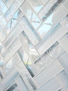 a close up view of some glass tiles