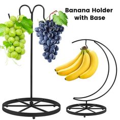 there is a banana holder with base next to some grapes and bananas on the stand