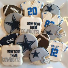 cookies decorated to look like footballs and helmets with the words how bout them cowboys