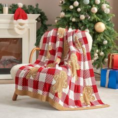 a living room with a christmas tree and presents