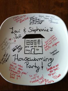 a plate with writing on it that says housewarming party