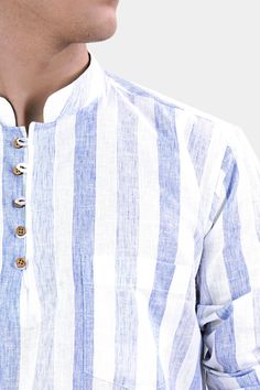 Elevate your summer style with our Hoki Blue and White Striped Luxurious Linen Kurta Shirt. Crafted from the finest linen, it offers a perfect blend of comfort and sophistication. Whether you're strolling along the beach or attending a casual gathering, this kurta shirt exudes relaxed elegance that's bound to turn heads and keep you cool in the heat. Fused collar and cuffs, collar stand and flat felled side seams provide structure and stability to all our shirts. Linen-Cotton blend: The structur Light Blue Long Sleeve Summer Kurta, Light Blue Cotton Kurta For Summer, Casual Indigo Kurta For Summer, Summer Light Blue Cotton Kurta, Blue Long Sleeve Kurta For Summer, Indigo Shirt With Relaxed Fit For Summer, Summer Indigo Shirt With Relaxed Fit, Casual Summer Blue Kurta, Casual Blue Summer Kurta