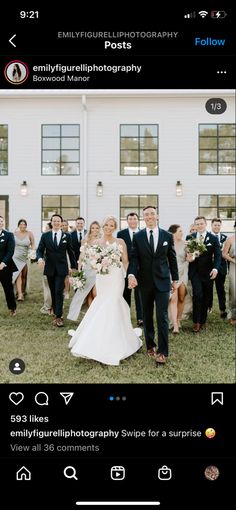 a group of people that are standing in the grass