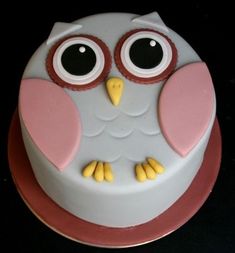 a cake with an owl design on it