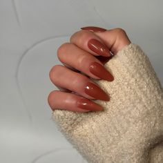 Get ready to embrace the beauty of autumn with our ultimate guide to fall nails! From rich, warm hues like deep burgundy and burnt orange to eye-catching nail art featuring leaves, pumpkins, and cozy patterns, we have everything you need to elevate your manicure this season. Discover trendy techniques such as ombre effects, matte finishes, and glitter accents that perfectly capture the essence of fall. Our easy-to-follow tutorials and expert tips make it simple to achieve stunning looks at home, Nails For Orange Outfit, Fall Nails 2023 Trends Red, Fall Nails 2023 Oval, Dark Orange Almond Nails, Orangish Red Nails, Red Orange Fall Nails, Rusty Red Nails, Burnt Sienna Nails, Burnt Red Nails