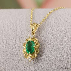 "Complete your vintage-inspired ensemble with our Art Deco Emerald Pendant Necklace. This exquisite piece, available in 14K and 18K gold options, features a captivating natural emerald at its center, and diamonds. A timeless addition to your jewelry collection, perfect for adding a touch of glamour to any occasion. F E A T U R E S 💎 D I A M O N D Carat: 0.04 Quality: VS1 Color: F-G Cut: Round 💠 G E M S T O N E Type: Natural Emerald Carat: 0.45 Cut: Oval 🌟 M A T E R I A L Gold: Available in 14K and 18K Options Color: Choices of White, Rose, or Yellow Chain: Cable Closure: Spring Ring 🎁 Extra Touch: As a testament to our dedication to exceptional customer service, each purchase is accompanied by a complimentary product certificate. Your order will be elegantly presented in a stylish box Emerald Gold Necklace, Diamond Gold Necklace, Gold Necklace Wedding, Emerald Necklace Pendant, Always Shine, Emerald Pendant, Necklace Wedding, Emerald Necklace, Custom Jewelry Design