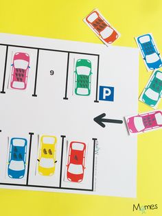 a parking lot with cars and arrows pointing to the parking spaces on each side that are numbered in different colors