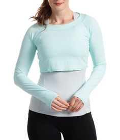 Reach for the BloqUV UPF crop shirt when you want sun protection for your arms and shoulders without adding bulk. This midriff top was designed to be worn over your favorite tank, sun dress or swimsuit to provide superior SPF sun protection while keeping cool. Perfect for activities on and off the water: running, biking, swimming, paddle boarding, fishing, beach tennis, pickle ball, tennis, golf, and sightseeing. Enjoy your multi-use capri sun shirt for any activity. It has thumb holes for hand protection. Our fabric, BloqTek™, is exclusive to BloqUV. It’s UPF protection never washes out and provides 5 degrees cooling effect when wet with water or sweat. BloqUV is proud to have earned The Skin Cancer Foundation's Seal of Recommendation for our UPF 50+ fabric. Our fabric is tested in accord Midriff Top, Capri Sun, Sun Shirt, Crop Top Shirts, Sun Dress, Performance Outfit, Paddle Boarding, Crop Shirt, Long Sleeve Crop Top