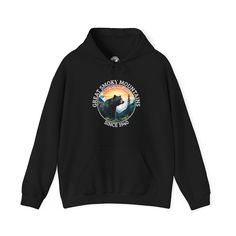 Get ready to showcase your love for the Great Smoky Mountains in style with the ultimate National Park hoodie! This isn't just any hoodie; it's a wearable tribute to the smoldering beauty of the Smokies, featuring a majestic black bear silhouetted against a backdrop of lush mountains and a captivating sunset. Crafted for comfort and designed with passion, this tee captures the essence of the Great Smoky Mountains with vibrant colors and stunning graphics. The front pocket detail adds a touch of class, while the large back print makes a bold statement about your love for America's most visited national park. Whether you're trekking through the trails, gathering around a campfire, or reminiscing about your mountain adventures, this hoodie is your go-to garment. It's not just a piece of cloth Dachshund Through The Snow, Bear Silhouette, Bear Hoodie, Wild Spirit, Bear T Shirt, Great Smoky Mountains, Smoky Mountains, Military Green, Pocket Detail