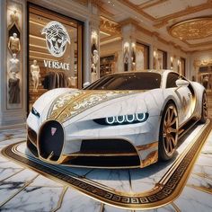 a white and gold bugatti on display in a store