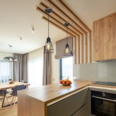 a kitchen with wooden cabinets and an oven