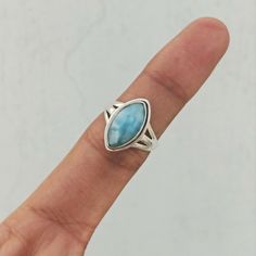 "Important : PLEASE ENTER YOUR PHONE NUMBER IN THE \"NOTE TO SELLER\" SECTION DURING CHECKOUT, SO THAT THE DELIVERY CAN BE HASSLE FREE. Material: Solid Sterling silver Stone: Larimar stone size: varies( According to the ring sizes) ships worldwide from India 925 stamped Handmade item Our products are totally handmade and made with high quality gemstones and 925 solid sterling silver. If you believe in buying top quality products for yourself and for your family and friends, SilverDynasty is the Unique Turquoise Larimar Gemstone Ring, Unique Turquoise Larimar Ring, Adjustable Larimar Turquoise Ring, Adjustable Turquoise Larimar Ring, Unique Larimar Turquoise Ring As Gift, Silver Larimar Promise Ring, Bohemian Larimar Ring As A Gift, Stamped 925 Larimar Rings As A Gift, Handmade Turquoise Larimar Rings