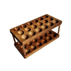 two wooden trays with holes in them