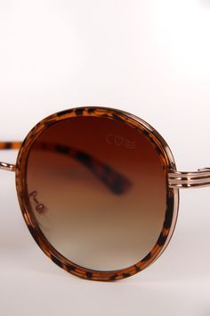 Introducing our Oval Ombre Tortoise sunglasses, where timeless design meets modern allure. These exquisite eyewear pieces are the embodiment of elegance, featuring distinctive tortoise frames that effortlessly merge classic aesthetics with contemporary fashion. The oval shape of the frames exudes an air of sophistication and versatility, making them an ideal choice for those who appreciate understated luxury. Crafted with meticulous attention to detail, the tortoise frames showcase a captivating