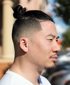 We can see this one mostly in the muscular dudes with that thin man bun on top, with all the hair tied tightly to it. The sides are undercut tapered usually but here it is low faded to the point where the temple doesn't exist. The line ups are clea Man Bun Haircut, Man Bun Undercut, Man Bun Styles, Fine Hair Men, Asian Man, Great Haircuts