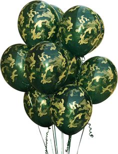 a bunch of green and gold balloons in the air