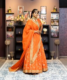 The attractive orange color with all-over gold embroidery in the floral jaal is enough to fetch all the eyes. Delicate embroidery is done with cutdana, sequins and zari with light pink resham and mint color flowers. The classic silhouette adds to the royalty of this lehenga. This lehenga is perfect for the anytime occasions. You have the option to change the color of the garment and make it according to your requirements. Please contact our Sales Team through WhatsApp +61470219564 to discuss you Curated Outfit, Add Sleeves, Delicate Embroidery, Embroidery Materials, Types Of Embroidery, Embroidered Wedding, Wedding Lehenga, Gold Embroidery, Mint Color