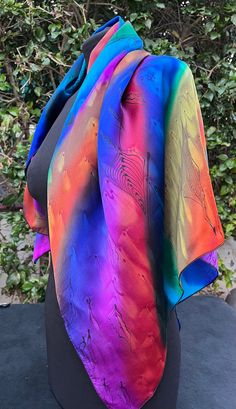 "One of a kind hand painted satin silk Scarf. size on picture: 35\"/35\" scarf. Lovely mixture of many colors, mingling with each other to create a lovely colorful feeling to wear with your favorite outfit. Imagine this with any outfit, it can be on a Winter White jacket or a black shirt for that WOW look!   Something new for Fall and Winter !! I am loving these silk scarves! Care:  Hand wash separately, iron on the rare side, appropriate heat for silk To see more scarves click here: https://www.etsy.com/shop/EdnaSilk? For other Jewish gifts in my store click here: https://www.etsy.com/shop/EdnaSilk Feel free to contact me with any question you have! Edna" Scarf Bag, Abstract Leaves, Jewish Gifts, In Addition, Satin Silk, White Jacket, A Drawing, Silk Scarves, Winter White