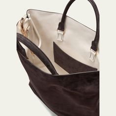 Gabriela Hearst "Eileen" tote bag in suede  Rolled top handles, 6" drop/ 0.8"W Exterior, D-ring clip Approx. 18"H x 16"W x 4"D Made in Italy Suede Tote Bag, Ring Clip, Suede Tote, Gabriela Hearst, North South, Bergdorf Goodman, D Ring, Tops Designs, Handles