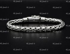 925 Sterling Silver  handmade  braided bracelet            Metal   :  925 sterling silver 8  inches  35.80 grams  Measurement:   6.00 mm wide          All silver are 100% genuine.  Not plated. Disclaimer:  Please allow +/- 0.20 grams weight difference. h3--13786--13794 Handmade Classic Sterling Silver Braided Bracelets, Classic Handmade Sterling Silver Braided Bracelet, Elegant Sterling Silver Braided Bracelet, Elegant Braided Sterling Silver Jewelry, Luxury Silver Braided Bracelet For Formal Occasions, Classic Handmade Silver Braided Bracelets, Elegant Braided Sterling Silver Bracelet Gift, Elegant Braided Sterling Silver Bracelet, Silver Sterling Braided Bracelets