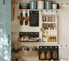 the shelves are filled with spices and condiments