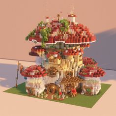 a very large and colorful building made out of legos in the shape of a mushroom